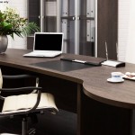 laptop and flowers on the table in a modern office